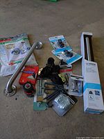 Group view of all hardware items on floor