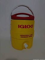 Front view showing Igloo logo, spigot, handle and lid