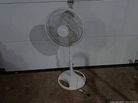 Full view of Lasko pedestal fan on floor