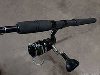 Handle and reel close-up showing PENN Pursuit IV spinning reel and EVA grip
