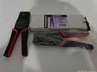 Used crimp tool alongside boxed new tool