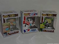 Overall view of three Funko Pop! figures in boxes