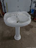 Full view of assembled porcelain pedestal sink