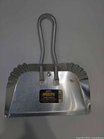 Front view of Quickie Jobsite aluminum debris pan