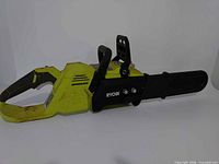 Left side view of Ryobi brushless 40V chainsaw body
