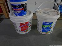 All three construction product pails displayed