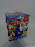 Front of Unique Helium Balloon Tank kit box showing product details
