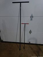 Both T-handle water meter valve wrenches side by side for size comparison