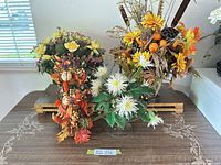 Group shot of all four floral centerpieces on table