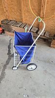 Full view of cart assembled showing frame, wheels and handle
