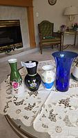 Group shot of all four vases on table