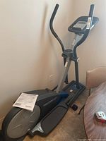 Full view of elliptical with manual on top