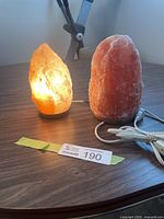 Both salt lamps side by side lit and unlit