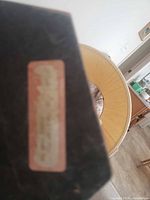 blurred underside label on lamp base