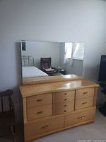 Front view of dresser with attached mirror