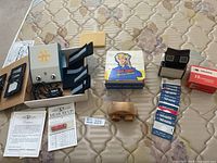 All items spread on mattress for overview