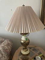 Full view of one lamp showing shade and base