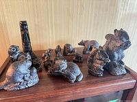 All figurines arranged on shelf