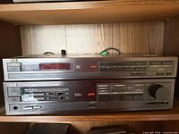 Front view of stacked JVC T-GX2 tuner and A-GX2 amplifier