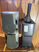 Overall view showing two RCA speakers, Altec Lansing subwoofer, and Altec Lansing satellite component