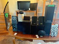Group shot of all speakers on a table