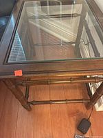 Oblique top view showing glass inset and wood frame