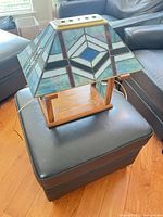 Full view of lamp showing shade and wooden base