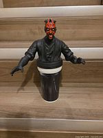 Front view of Darth Maul bust on cup
