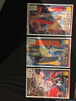 Front view of three bagged Magic: The Gathering comics