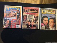 Front covers of all three Pro Wrestling Illustrated issues side by side