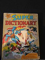 Front cover with title and DC superhero artwork