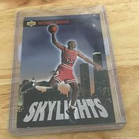 Front view of Upper Deck Skylights Michael Jordan card in plastic case