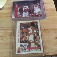 Both Michael Jordan cards in holders