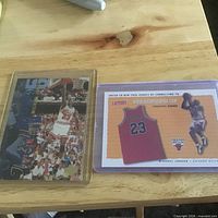 Both Jordan cards side by side in sleeves