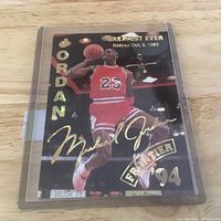 Front of Michael Jordan Gold Signature card in holder