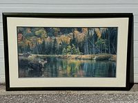 Framed lithograph showing full artwork and frame