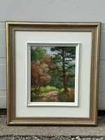 framed painting front view showing gold frame, mat and artwork