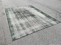 Full rug laid out showing overall pattern and wear