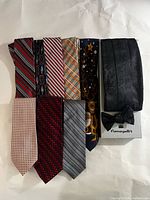 All ten pieces laid out showing front designs and Fumagalli’s box
