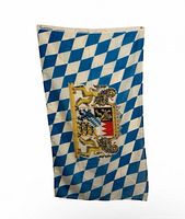Blue and white diamond pattern flag with crest, appears in listing images