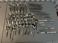 Flatware laid out showing full assortment