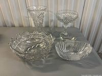 all six clear glass pieces grouped together