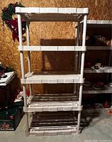 Full view of Rubbermaid beige plastic 5-shelf storage rack