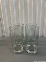 Four ribbed highball glasses group shot