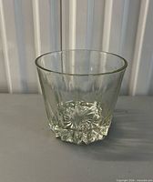 Front view of clear glass ice bucket