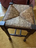 Top view showing woven rush seat and corner blocks