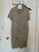Front view of taupe Gerry Weber shirt-waist dress hanging