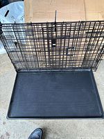Crate unfolded with plastic pan inserted