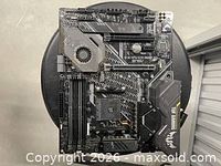 Full view of the ASUS TUF Gaming X570-PLUS Wi-Fi motherboard showing layout and components