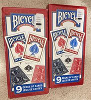 Front view of two sealed Bicycle retail display boxes
